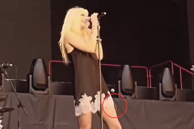 Taylor Momsen gets bitten by a bat on stage