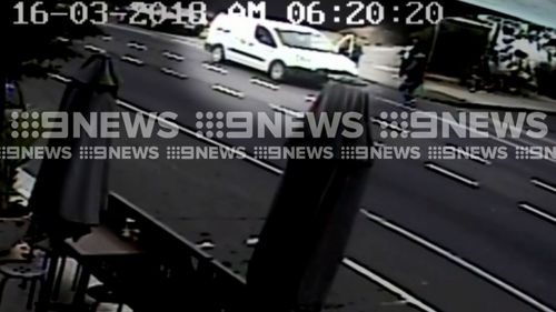 The driver left his car unattended for just a minute when the offender jumped in the front seat. (9NEWS)