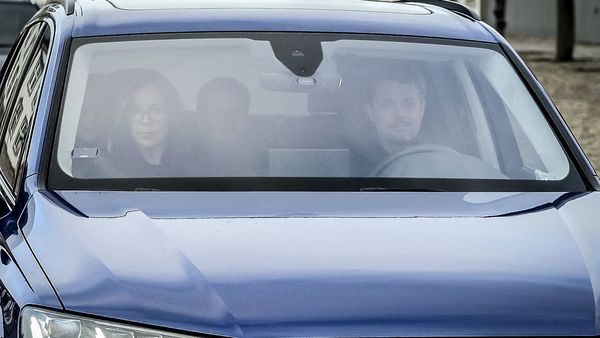 Danish Crown Prince Frederik, Princess Mary, and children arrive by car at Fredensborg Palace (Image: AAP)