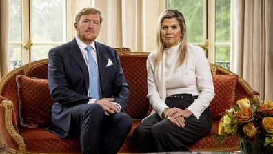 The king and queen of the Netherlands apologise for a recent family holiday to Greece.