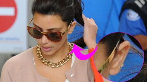Kim Kardashian wears Kanye West earrings
