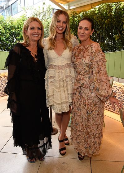 Simone and Nicky Zimmermann with Margot Robbie&nbsp;in Zimmermann, celebrating the launch of Zimmermann's London flagship store in Mayfair at the private members' club 5 Hertford St, London.