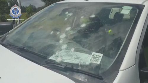 Bullets were also sprayed at the windscreen of the vehicle.