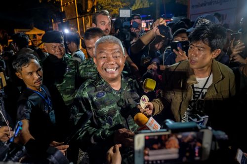 General Bancha Duriyaphan speaks to the press after confirming the team had been rescued. Picture: Getty