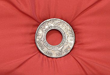 NSW's holey dollar was made from which European coins?