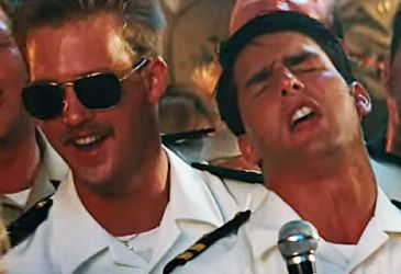 Which Righteous Brothers hit do Maverick and Goose perform in Top Gun?