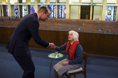 Prince William shakes hand with Renee Salt, 94, a Holocaust survivor, at the Western Marble Arch Synagogue, in London, Britain, Thursday, Feb. 29, 2024 