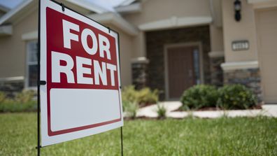 For Rent sign in front of new house