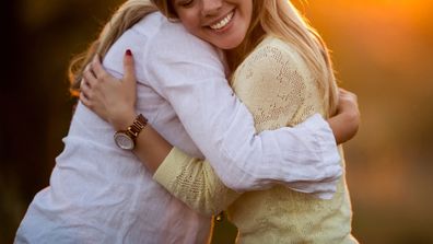 two women hugging