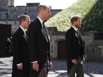 Britain's Prince Harry, from right, Prince William, Peter Phillips and Tim Laurence follow the coffin in a ceremonial procession for the funeral of Britain's Prince Philip inside Windsor Castle in Windsor, England Saturday April 17, 2021.