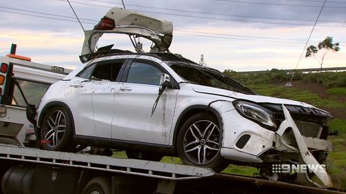 The car was a luxury Mercedes. One of the victims was a mechanic for the car company.