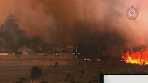 Emergency warnings have been issued for eight bushfires in New South Wales, including one grass fire that is threatening an explosives storage facility in the state's Central West region.