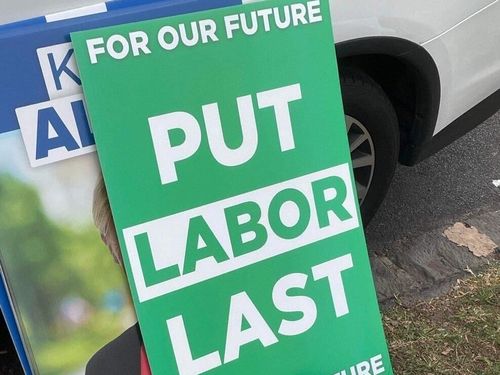 Labor is seeking an injunction over "Put Labor Last" signs appearing in Higgins, designed to look like they were placed by the Greens but allegedly from the Liberal Party.