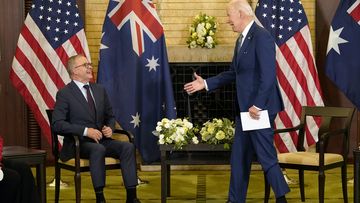President Joe Biden, right, jokes with Australian Prime Minister Anthony Albanese during the Quad leaders summit meeting at Kantei Palace.