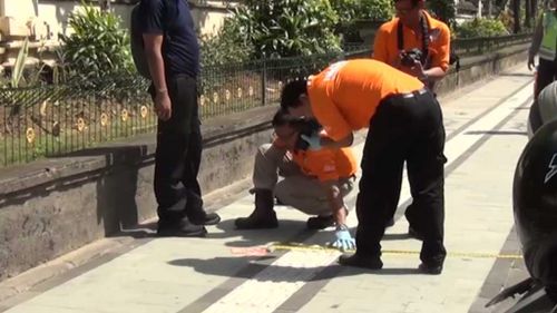 Police at the scene on Kuta beach. (9NEWS)