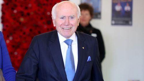 Former prime minister John Howard has urged Liberal voters to stay loyal in the battle for Wentworth.