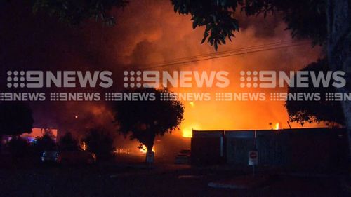 Residents were forced to evacuate after the fire set off a series of explosions.