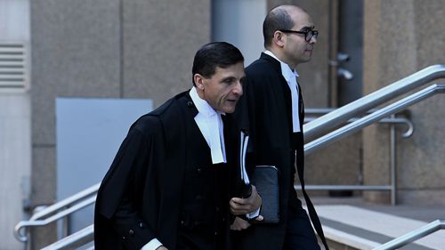 Arthur Moses (left) the Barrister for Ben Roberts-Smith arrives at the NSW Supreme Courts this morning in Sydney. 18th July, 2022. Photo: Kate Geraghty