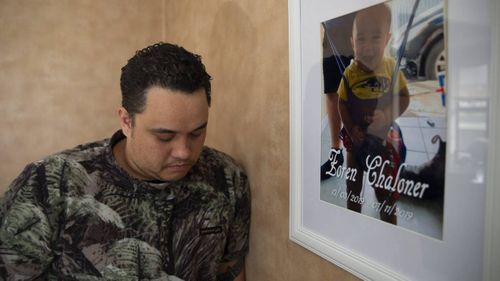 David Chaloner with a photo of his son Zoren Ngatokorua Israel Chaloner.