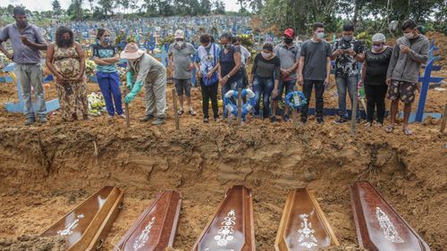 Coronavirus fatalities are buried in mass graves in Manaus, Brazil.