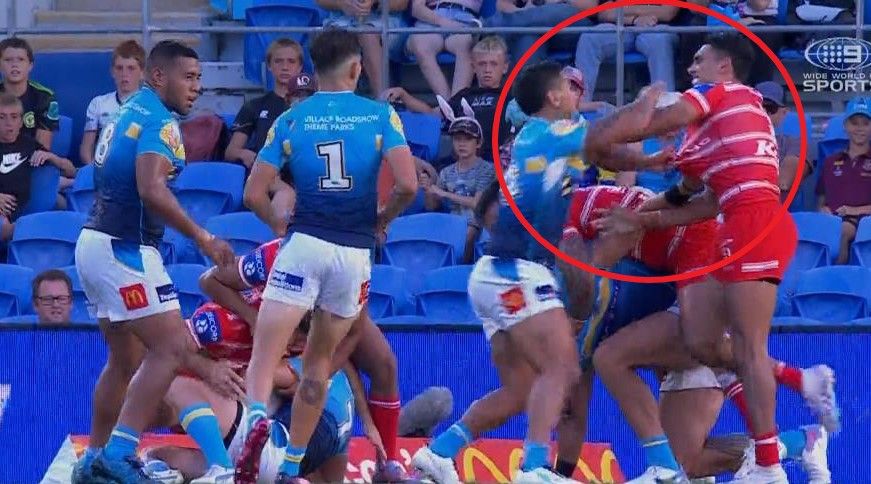 Titans player Erin Clarke appeared to throw a punch at Tyrell Sloan.