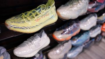 Yeezy shoes made by Adidas are displayed at Kickclusive, a sneaker resale store, in Paramus, N.J., Tuesday, Oct. 25, 2022. 