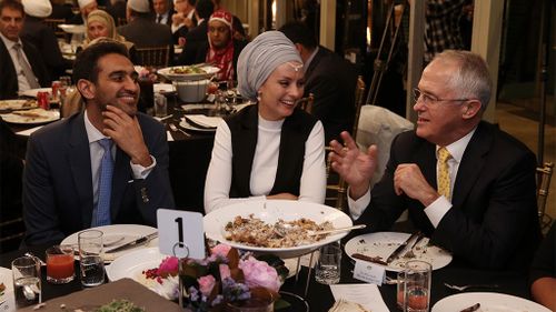 Gold Logie winner Waleed Aly and his wife Susan Carland talk with Malcolm Turnbull. (AAP)