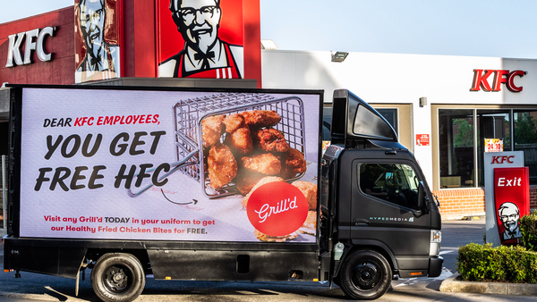 Grill&#x27;d billboard outside KFC store