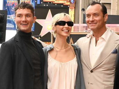 Jude Law with two of his children, Rafferty and Iris Law, and wife Phillipa Coan at his Hollywood Walk of Fame ceremony on December 12, 2024.