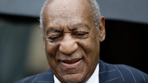Once-loved entertainer Cosby managed a familiar smirk as he entered the court house.