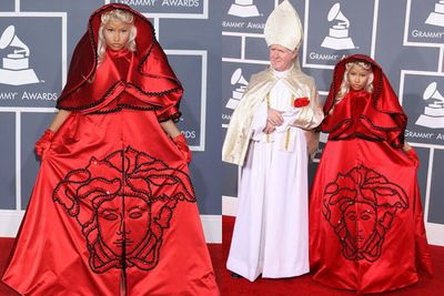Nicki Minaj's, erm, 'nod' to the Catholic church on the Grammys red carpet caused more than a tad of controversy.<br/><br/>Dressing in Vatican-esque cloaks, the hitmaker also turned up with a man dressed as the Pope.