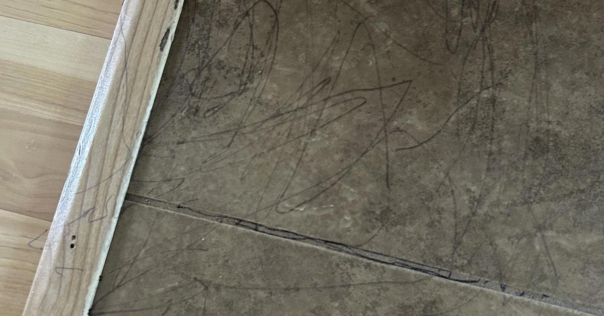 'Please help': Toddler takes to tiles with permanent marker