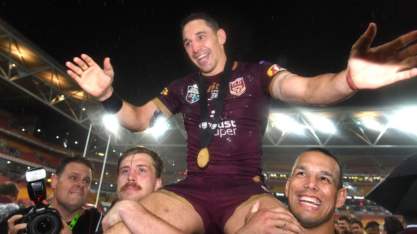 Billy Slater is chaired off the field wearing the Wally Lewis Medal.