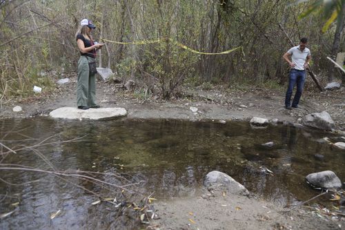 A person stands near the spot where Mark Salling, who played Noah "Puck" Puckerman in the hit musical-comedy "Glee," was found dead in a remote area of Big Tujunga Canyon in the Sunland-Tujunga area of Los Angeles. (AAP)