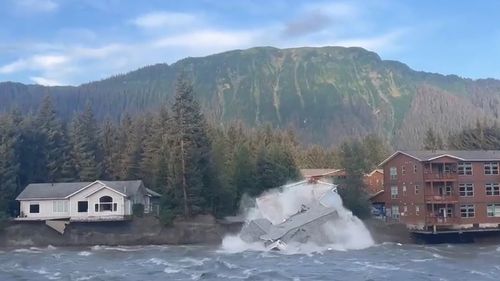 A house has fallen into a river in Alaska.