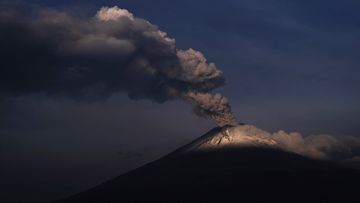 The Popocatepetl volcano spews ash and steam, seen from Santiago Xalitzintla, Mexico, Wednesday, May 24, 2023 