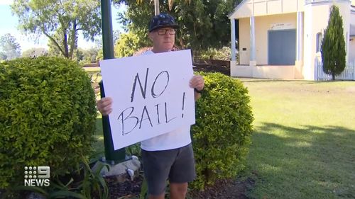 Maryborough man Marc Hazell protests outside court.