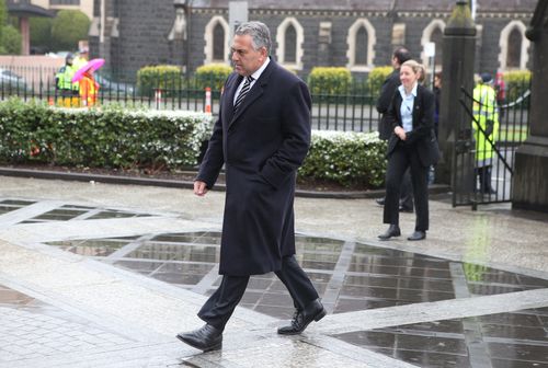 Treasurer Joe Hockey arrives at the MH17 memorial service at St Patrick's in Melbourne. (AAP)