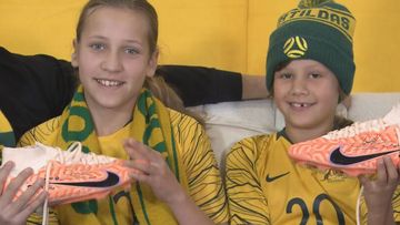 Vienna, 11, and Amalia Gergely-Hollai, 8, with Sam Kerr&#x27;s boots.