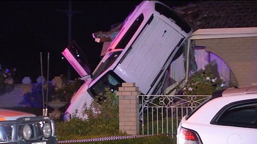 Airborne car almost lands on roof of house in Perth
