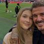 Beckham smiles with daughter after upsetting soccer match