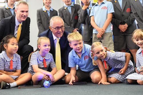 Mr Turnbull and Finance Assistant Finance Minister David Coleman visit Oatley West Public School in Sydney yesterday. (AAP)