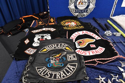  Seized bikie vests are seen at a press conference at Australian Federal Police (AFP) headquarters in Sydney. (AAP)