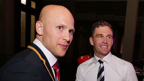 Gary Ablett (L) of the Suns congratulates Joel Selwood of the Cats on being announced in the All Australian Team Announcement. (Getty)