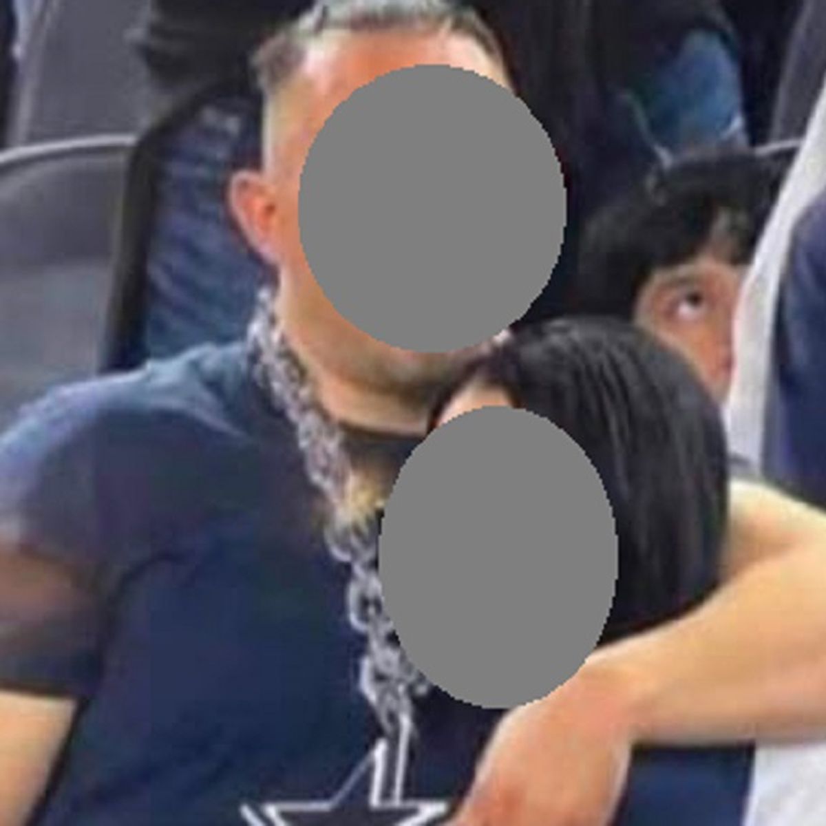 Dallas cowboys game Z girl friend aught boyfriend on jumbo tron