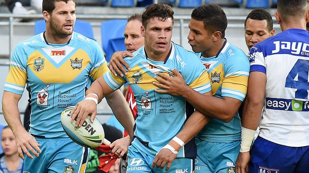 James Roberts celebrates a try for Gold Coast. (Getty)