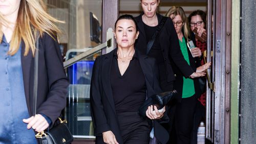 Vanessa Amorosi leaves the Supreme Court of Victoria in Melbourne, Thursday, October 12, 2023. Singer Vanessa Amorosi is suing her mother for ownership of two properties bought as a result of her success. (AAP Image/Aaron Francis) NO ARCHIVING