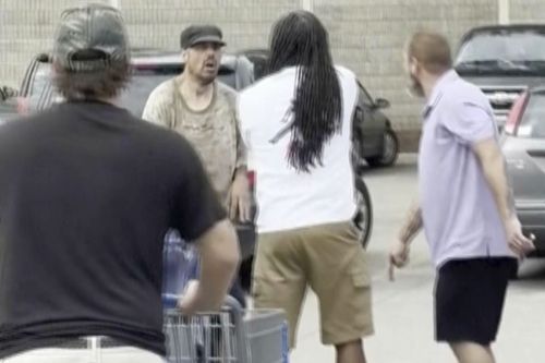Bystanders confront stabbing suspect Bradford Gille at Walmart.