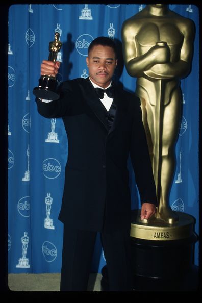 Cuba Gooding Jr holds his award for Best Performance By An Actor In A Supporting Role for "Jerry Maguire" at the 69th Annual Academy Awards ceremony March 24, 1997 in Los Angeles, CA.