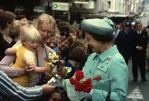 Queen Elizabeth ll smiles during a walkabout as she tours New Zealand on October 01, 1981 in New Zealand. (Photo by Anwar Hussein/Getty Images)